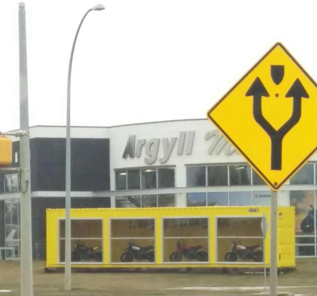 Interesting use of shipping container as display for a motorcycle sales location.